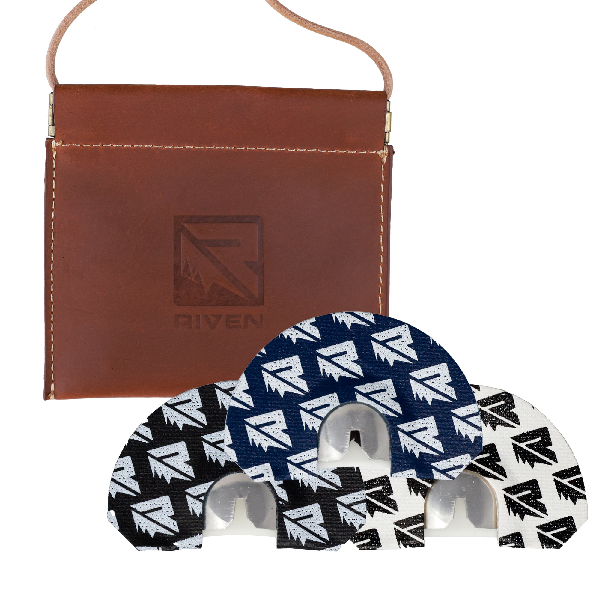 The Riven Cosmic Series Bundle features a brown leather pouch with the Riven logo, ideal for elk hunting accessories, displayed behind three circular finger tape rolls in black, blue, and white, each patterned with the Riven logo.